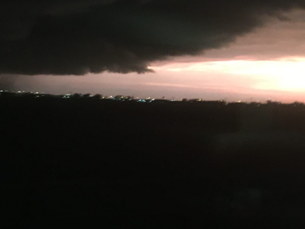 Dark clouds meeting a sunrise